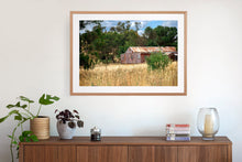 Load image into Gallery viewer, Photographic fine art print, depicting a rusty red Shed, near Yea, Victoria, with white frame. Browse to find a frame and photo combination that suits your decor.
