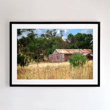 Load image into Gallery viewer, Photographic fine art, depicting a rusty red Shed, near Yea, Victoria, with a black frame. Browse to find a frame and photo combination that suits your decor.
