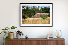 Load image into Gallery viewer, Photographic fine art, depicting a rusty red Shed, near Yea, Victoria, with a black frame. Browse to find a frame and photo combination that suits your decor.
