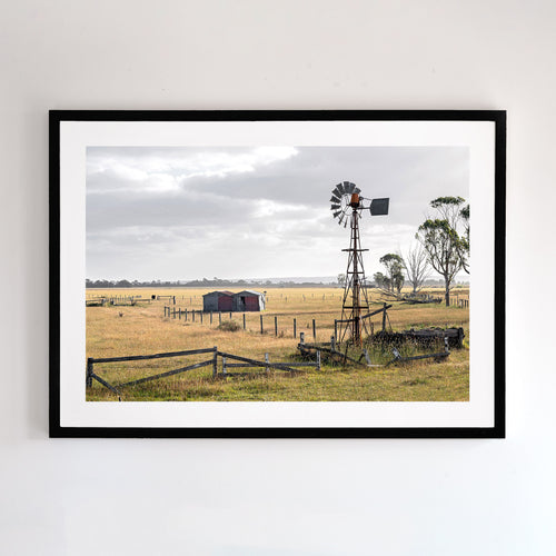 Fine art photograph or windmill and farmland. Fine art prints come with several frames options: oak, white and black. Or choose the “unframed” option to mount in your own frame.