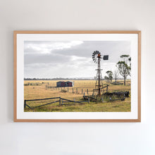 Load image into Gallery viewer, Fine art photograph or windmill and farmland. Fine art prints come with several frames options: oak, white and black. Or choose the “unframed” option to mount in your own frame.
