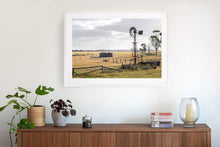 Load image into Gallery viewer, Fine art photograph or windmill and farmland. Fine art prints come with several frames options: oak, white and black. Or choose the “unframed” option to mount in your own frame.
