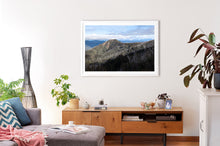 Load image into Gallery viewer, Photographic print of Little Buller with white frame, shown here in conventional living room. 
